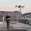 Danielle Warner flying a drone