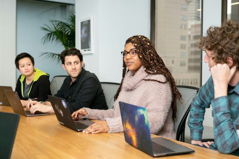group of people working together during a meeting