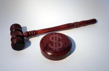 Gavel and dollar sign representing penalties