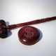 Gavel and dollar sign representing penalties