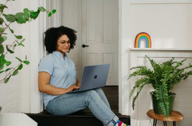 Woman sitting with her laptop
