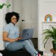 Woman sitting with her laptop