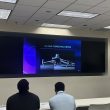 Woman teaching students at Florida International University about drone technology and applications.