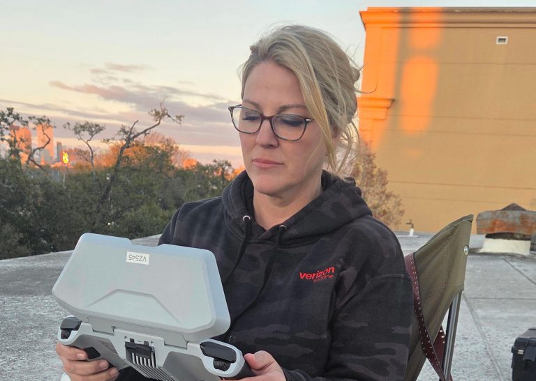 Licensed drone pilot setting up to begin crisis response mis