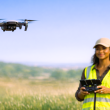 Female drone pilot flying a drone. Women remote pilots are increasing